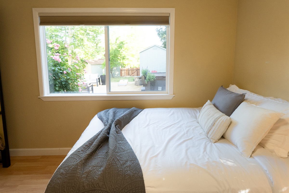 A bright, airy bedroom made even better with soft, plush bedding.