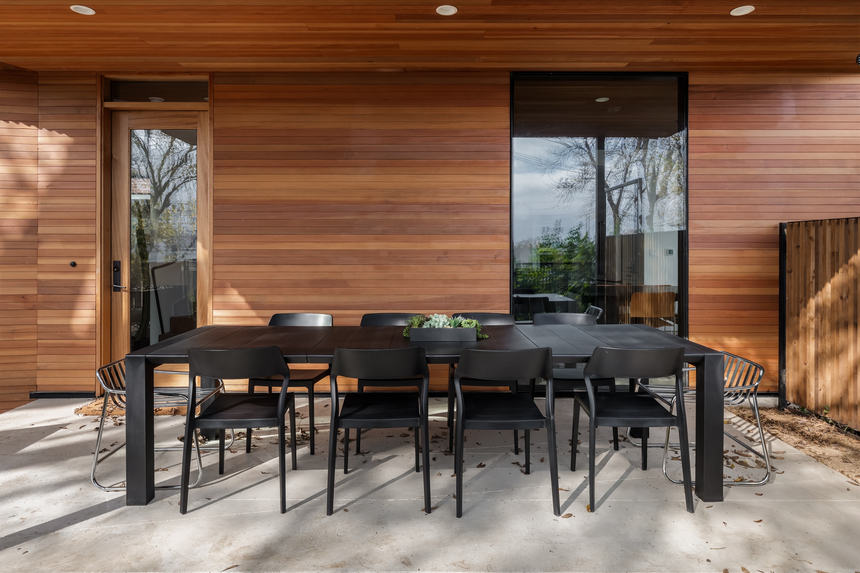 Large patio table with ample seating, ideal for group dinners, celebrations, or relaxing evenings outdoors.