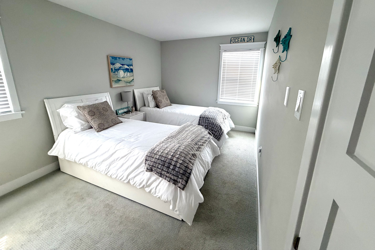 Two twin sized bed with twin trundles
