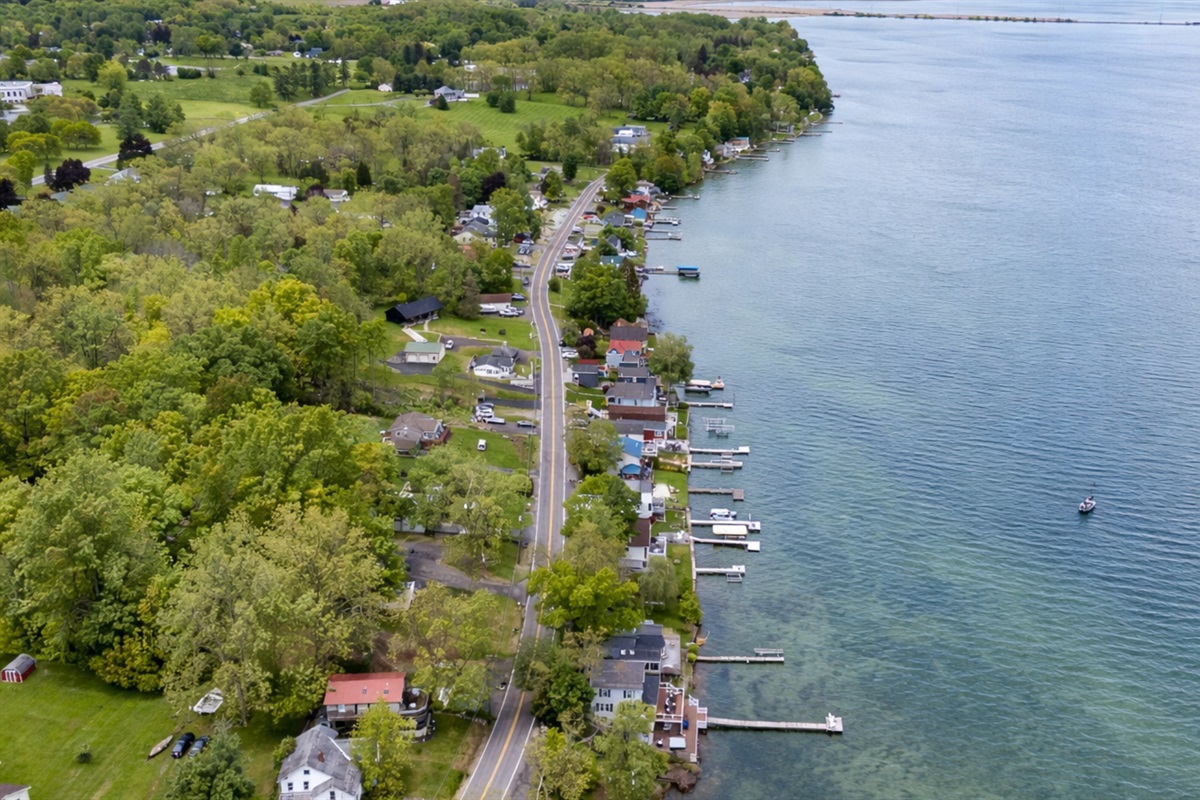 Nestled along a scenic shoreline, this cozy lakefront retreat sits in a charming and peaceful neighborhood 🌳🏘️✨