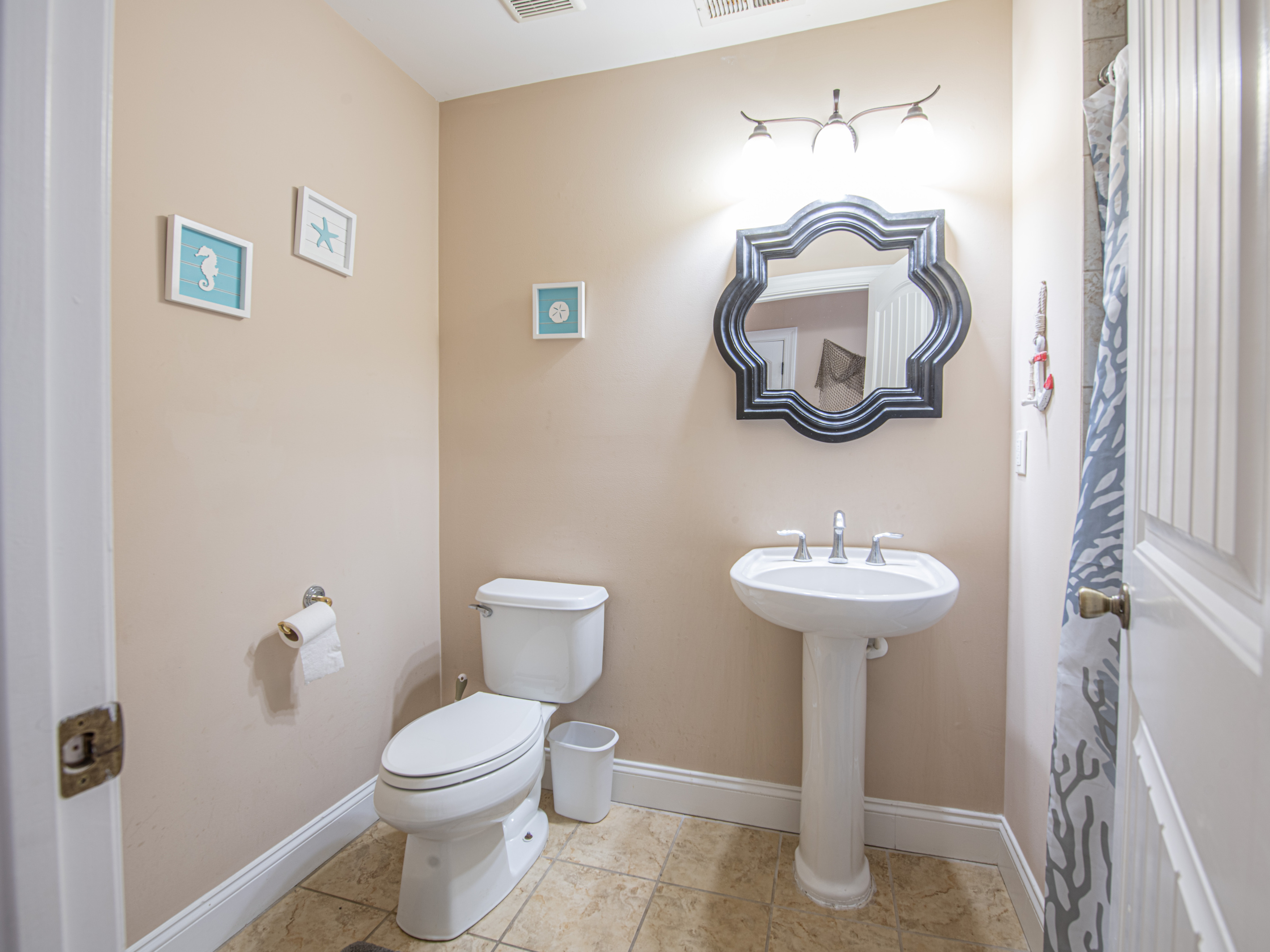 Bathroom 3 with Pedestal Sink and Decorative Mirror