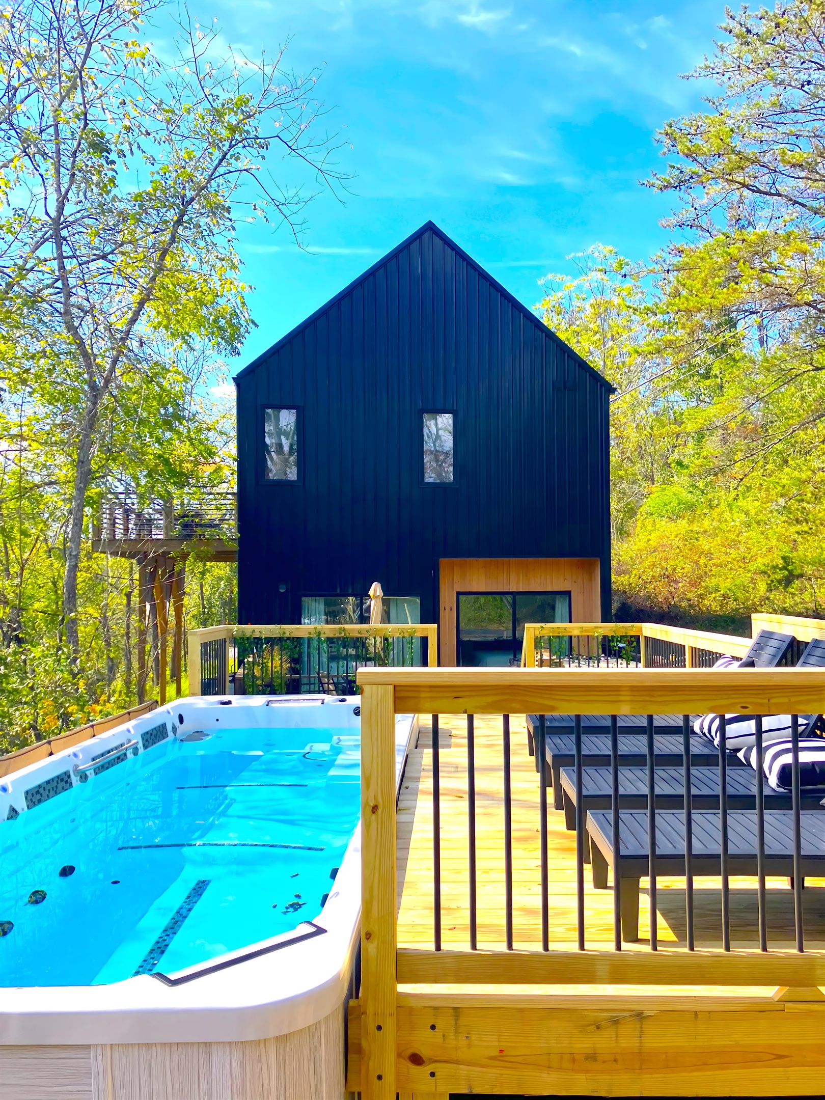 {Deck} Enjoy the Heated Swim Spa Pool, Cold Plunge, or Hot Tub.