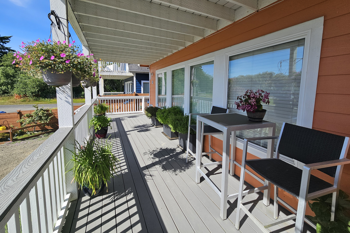 Enjoy your morning coffee on the bistro set, surrounded by an herb garden and hummingbird-attracting flowers