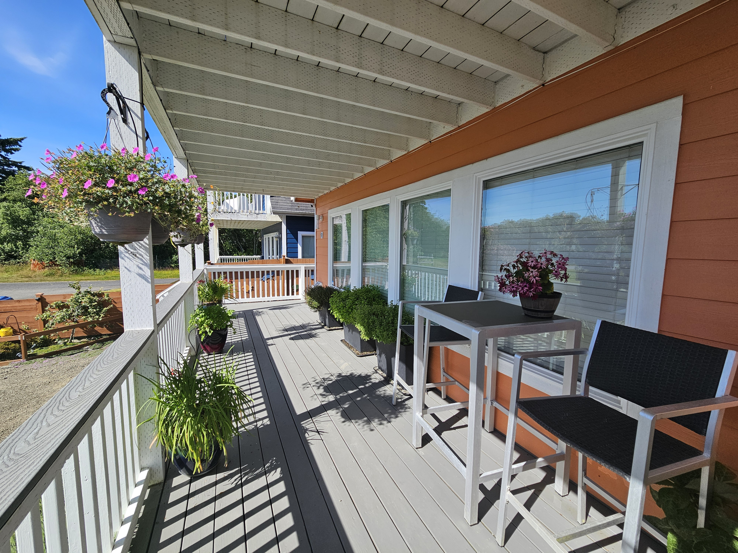 Enjoy your morning coffee on the bistro set, surrounded by an herb garden and hummingbird-attracting flowers