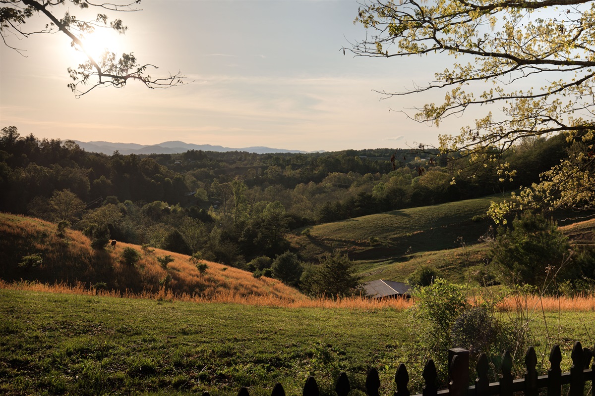 {Panoramic Views} Take in miles of rolling farmland and mountain foothills from one of the most serene settings in the Asheville area.