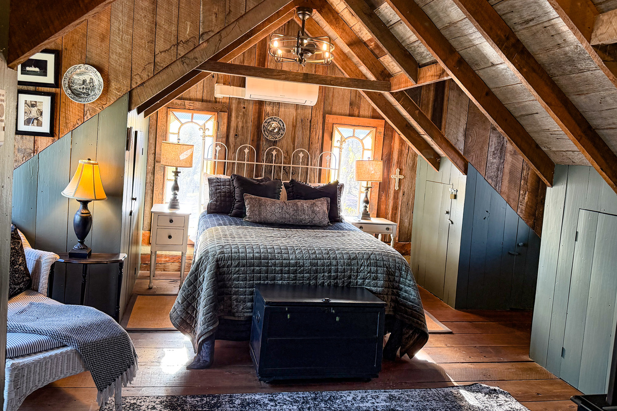 Queen bedroom is located over kitchen.