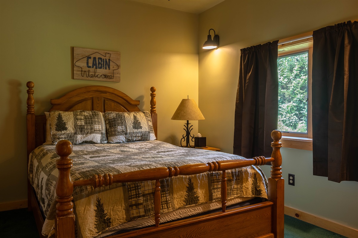 The lower-level bedroom also has a queen size bed.
