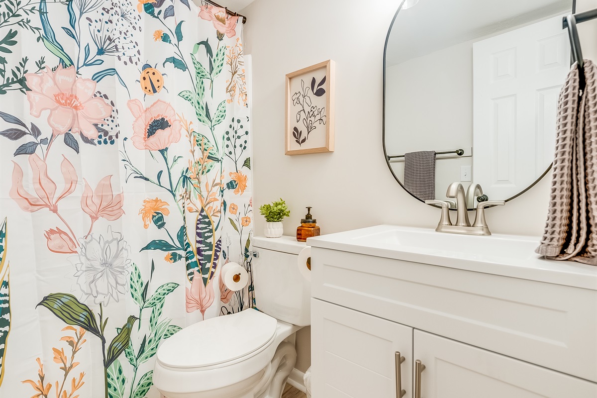 Clean and modern, the second full bathroom offers everything you need to refresh and recharge.