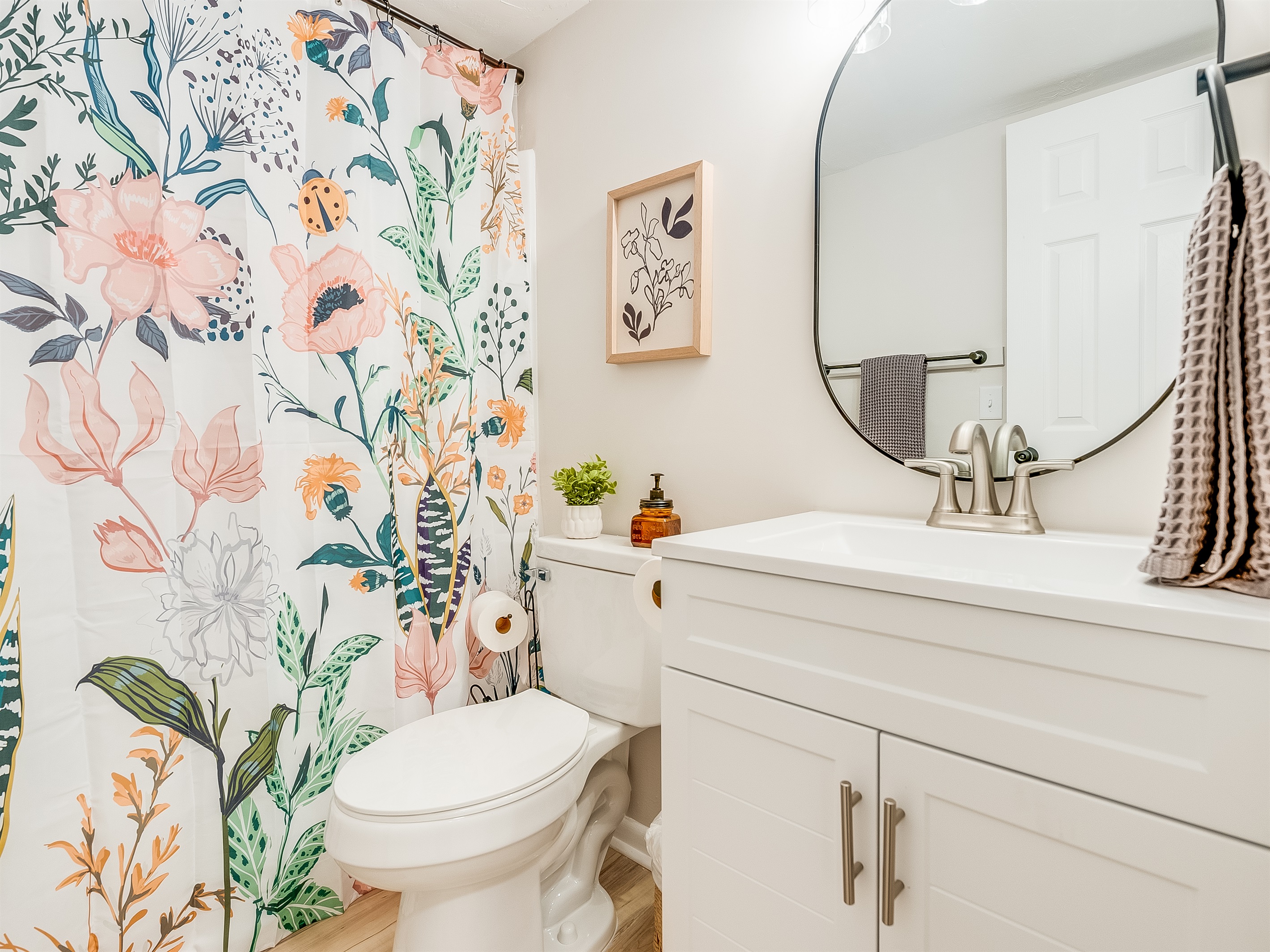 Clean and modern, the second full bathroom offers everything you need to refresh and recharge.