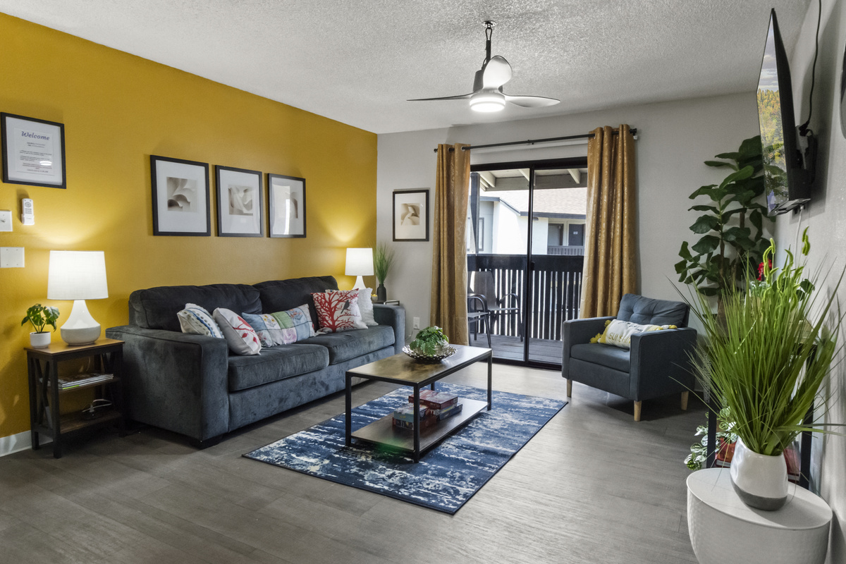Settle into the comfortable sofa and enjoy the stylish, welcoming atmosphere of this beautiful living space.