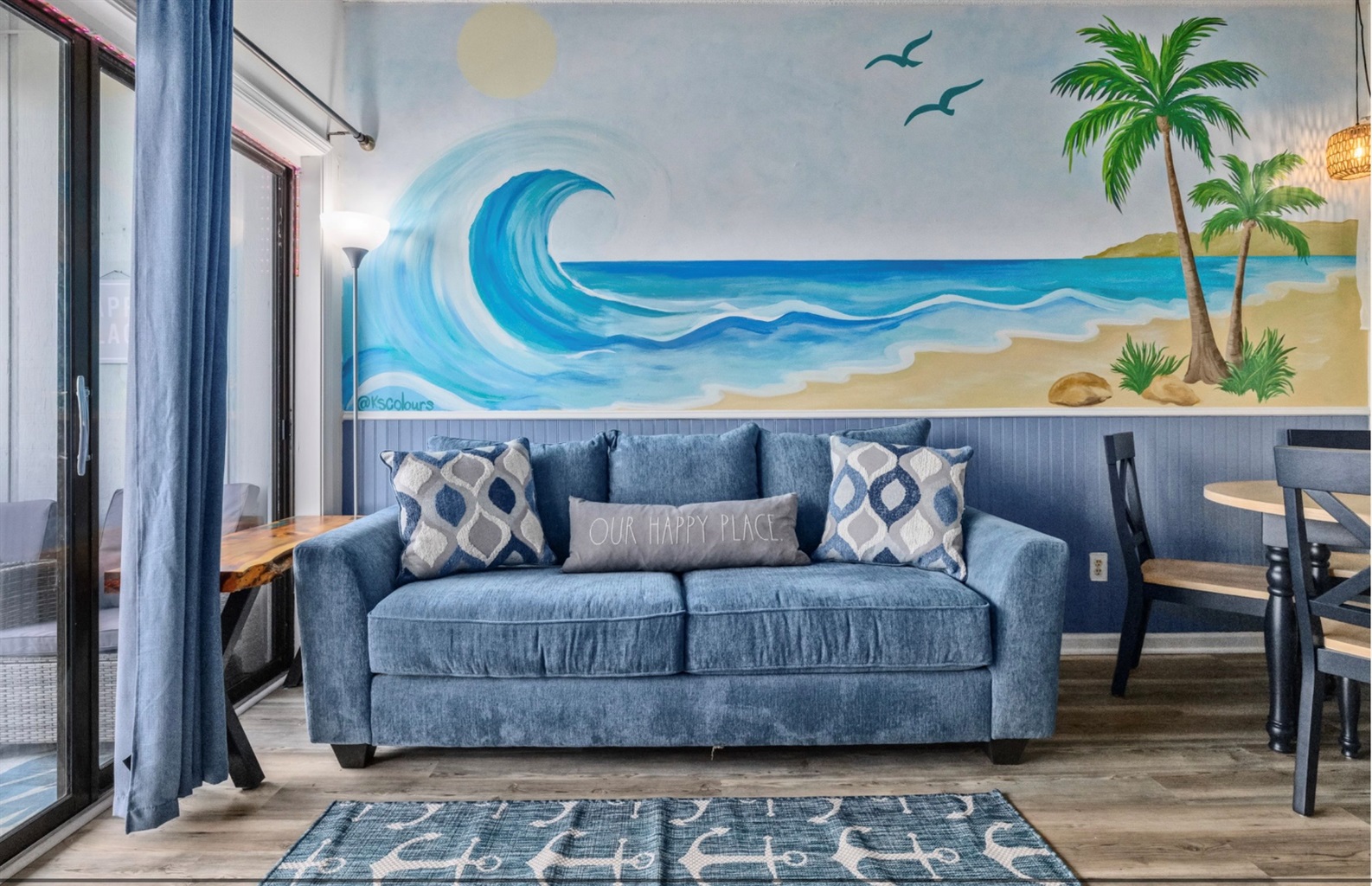 Sink into coastal comfort beneath a hand-painted ocean mural 🌊
Plush lounge seating, calming beach tones, and a space designed to unwind, reconnect, and fully slip into vacation mode.