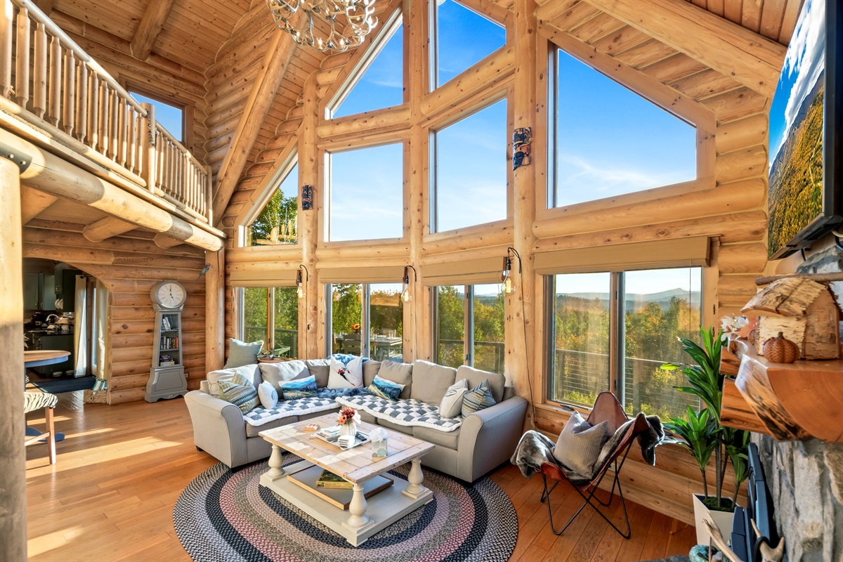 Relax and unwind in a bright, open space with stunning panoramic mountain views.