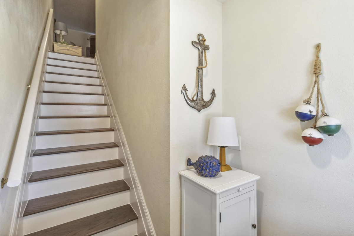 Walk through the foyer and feel the whole property open up &mdash; your beach vacation starts right here.