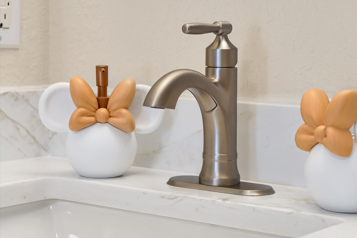 Mickey’s Rainbow Magic Bathroom – Playful Minnie-inspired accessories add a touch of Disney magic