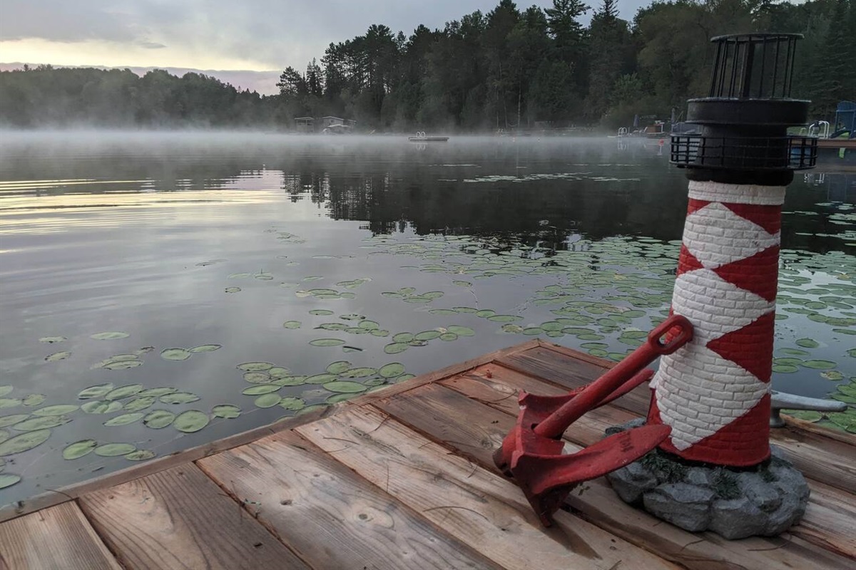 Morning mists rises from Lac St. Pierre seen from our dock
