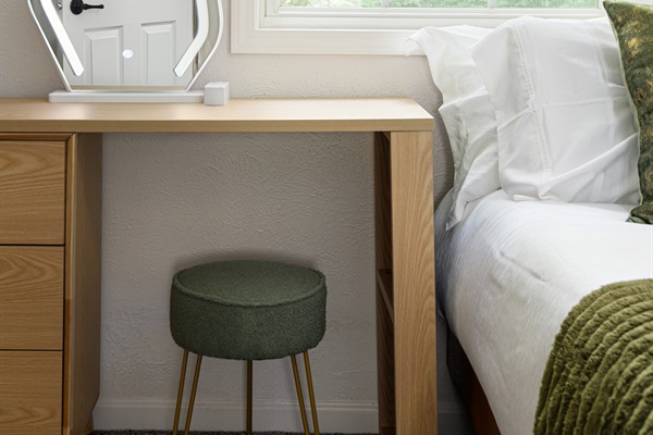 Our queen bedroom has the same amenities as our other bedrooms, plus . . .