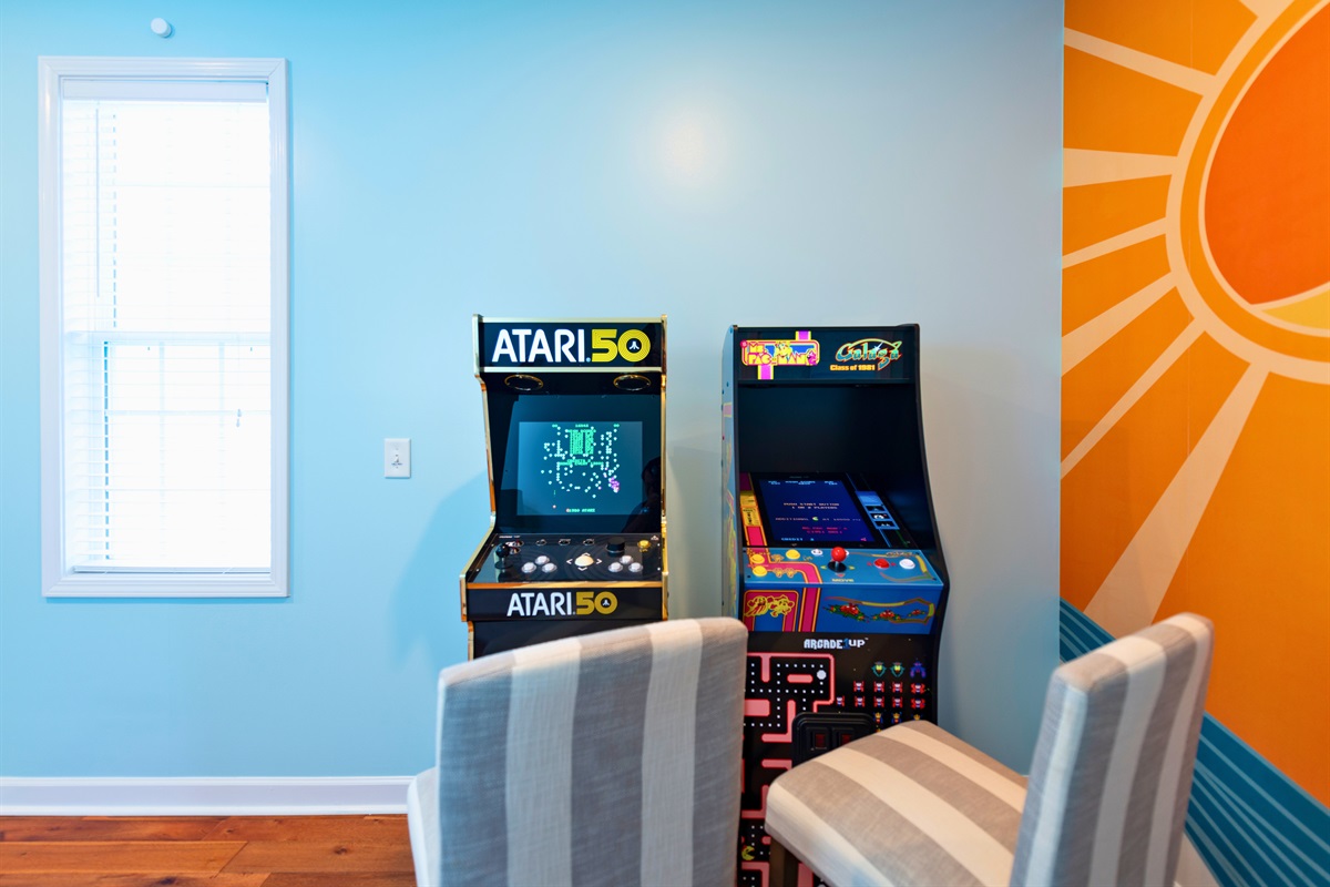 [ArcadeGames] Unwind in our upstairs lounge featuring two arcade machines with over 500 games! Perfect for fun-filled moments and friendly competitions, it's a great spot for guests of all ages to relax and play. #beachbliss