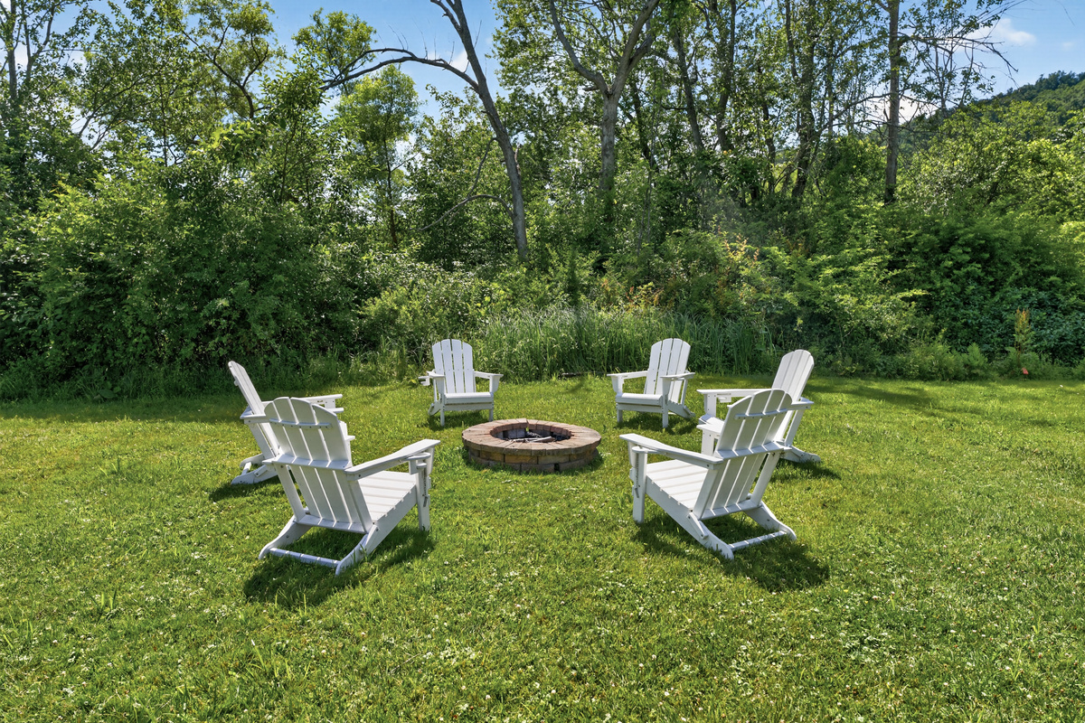 Fire pit with Adirondack chairs