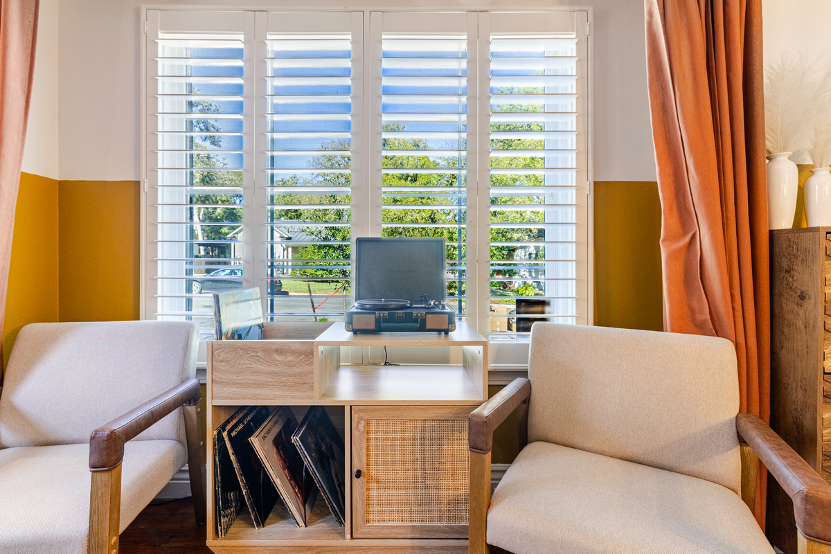 Vintage vibes meet modern charm, perfect for relaxing with records and sunshine!