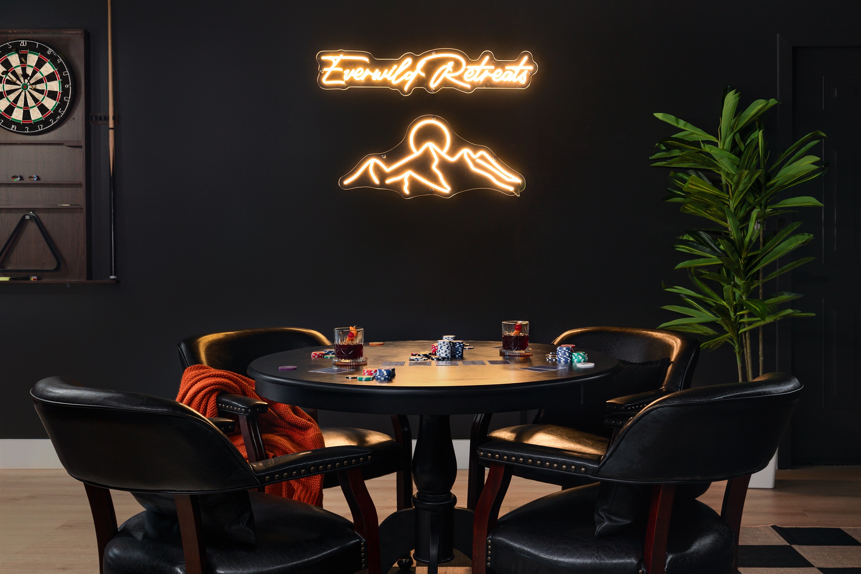 {Speakeasy Lounge}
Step into our moody speakeasy lounge designed for cocktails, card games, and after-dark connection. The perfect backdrop for celebrations, girls’ trips, or unforgettable nights in.