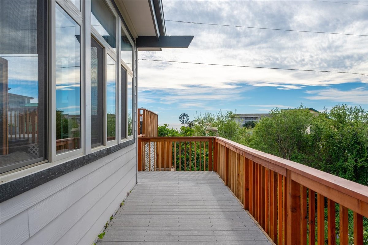 side deck looking over luscious creek side