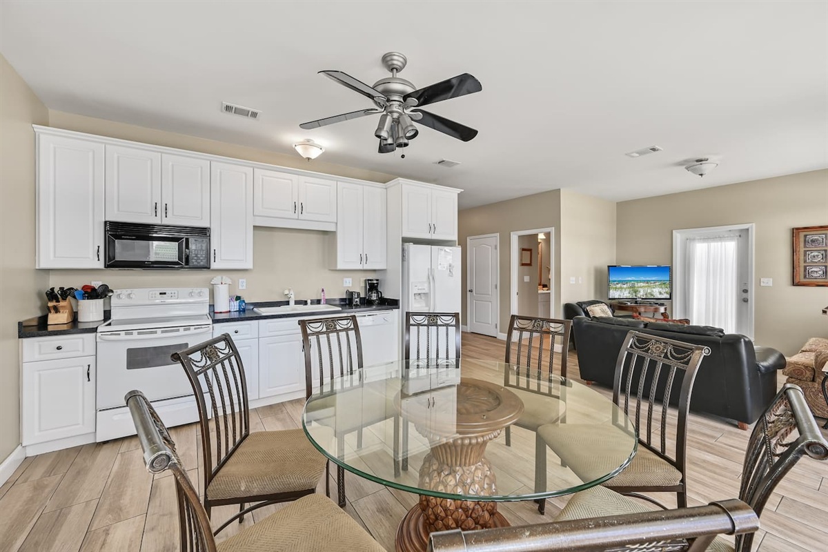 Dining Area #1 (First Floor)– Coastal round table seating 6