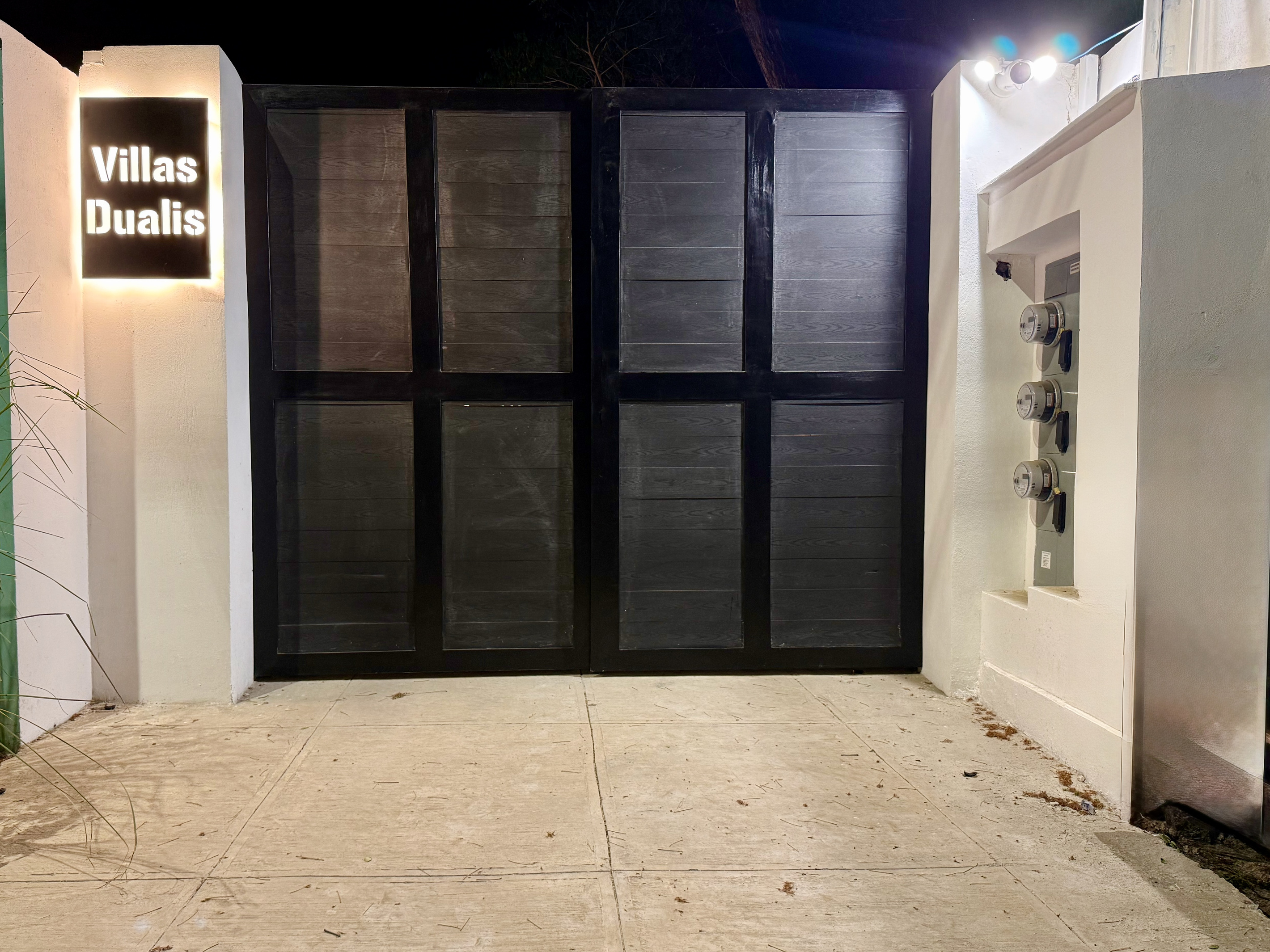 Entrance gate with keypad and remote control entry.