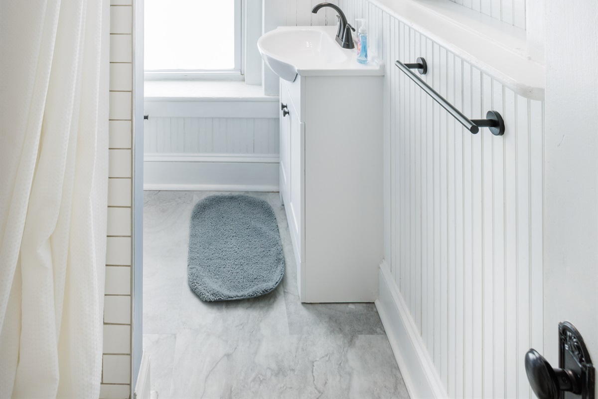 Peaceful and private space with modern fixtures. 2nd floor Full bathroom includes toilet, sink, and shower.