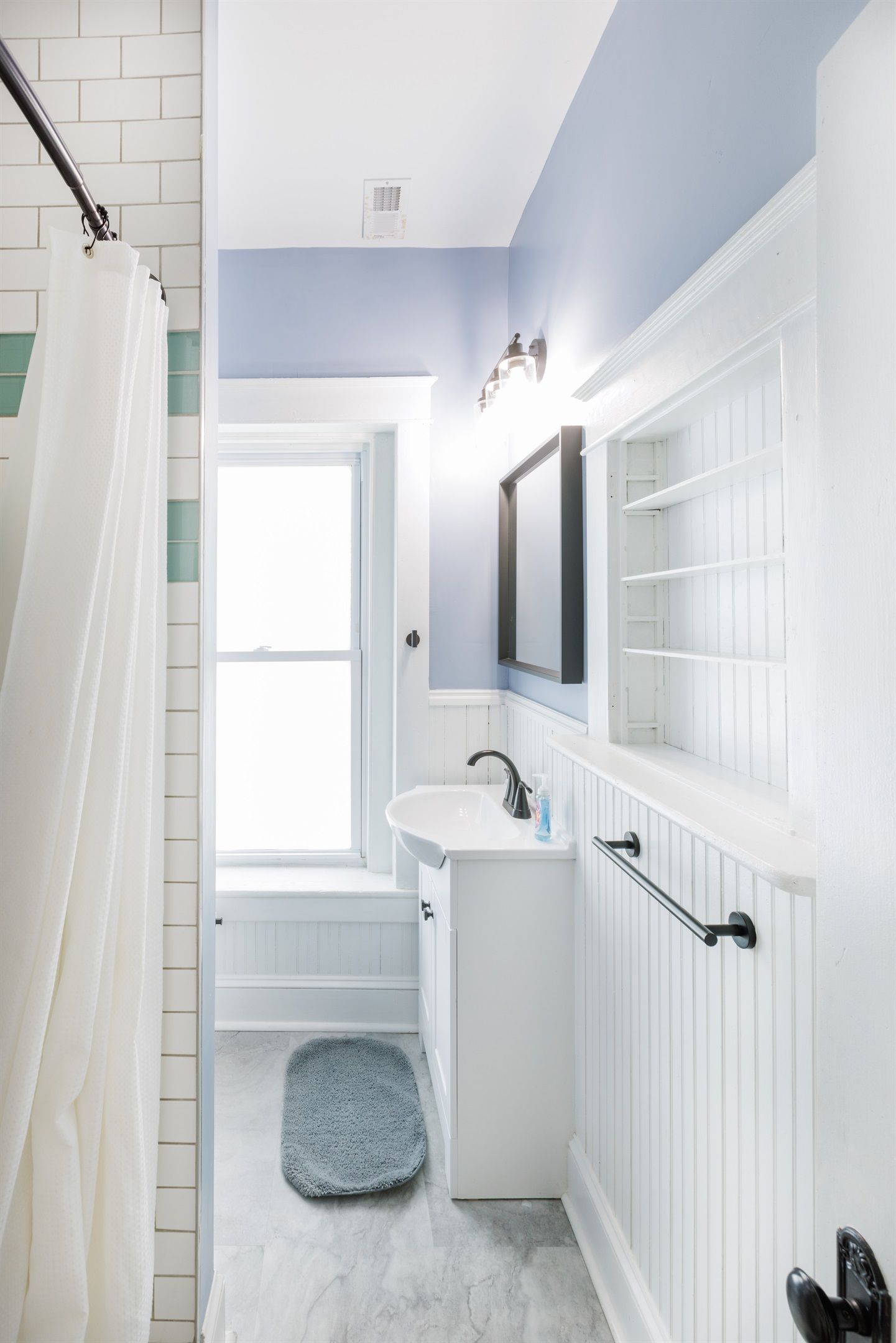 Peaceful and private space with modern fixtures. 2nd floor Full bathroom includes toilet, sink, and shower.