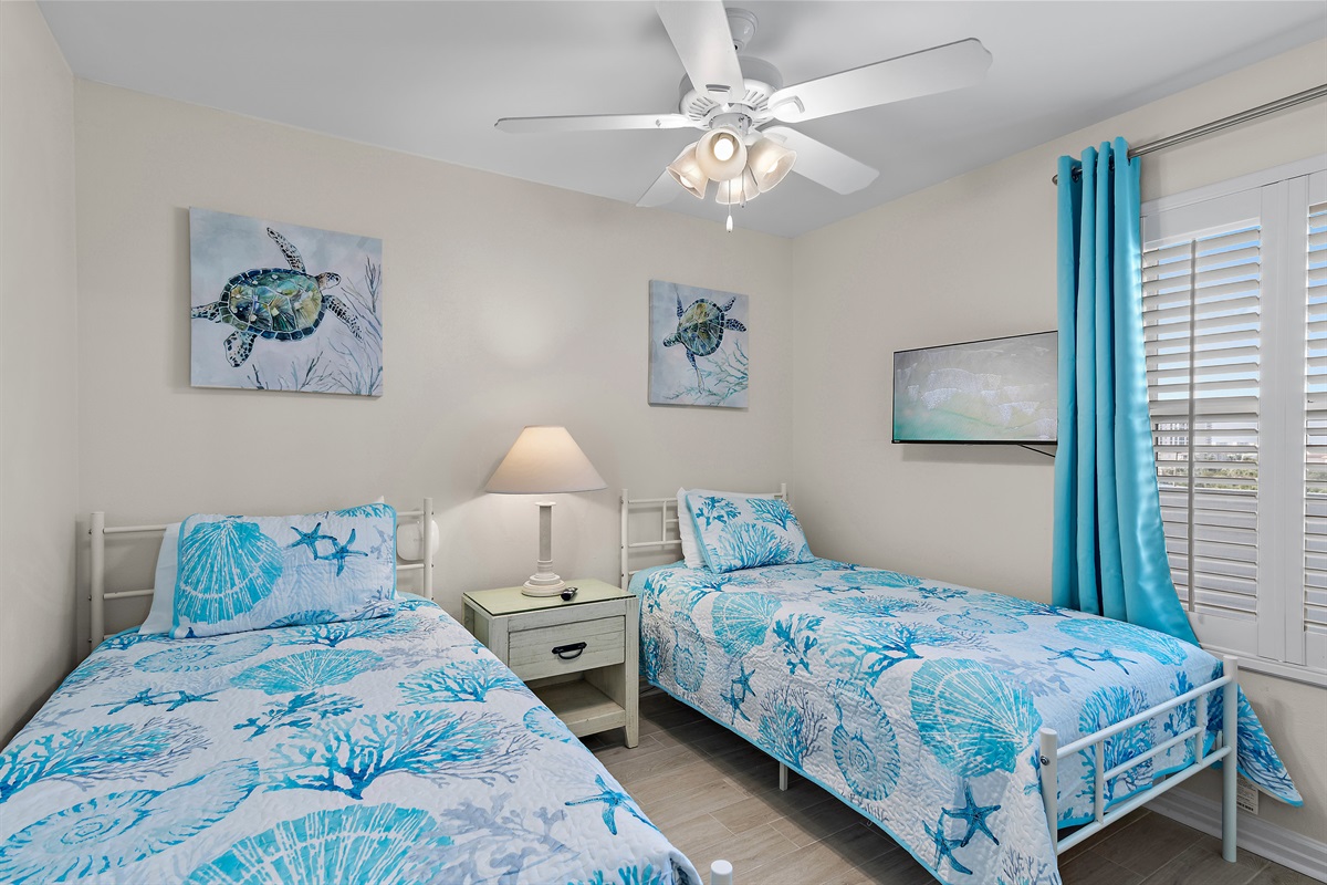 twin beds in second bedroom