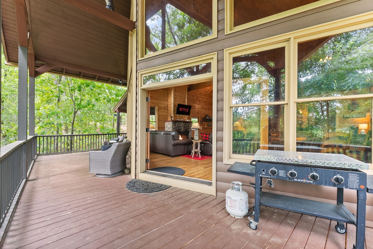 Outdoor propane grill ready for cookouts, sunset dinners, and easy cabin-style meals with family and friends.