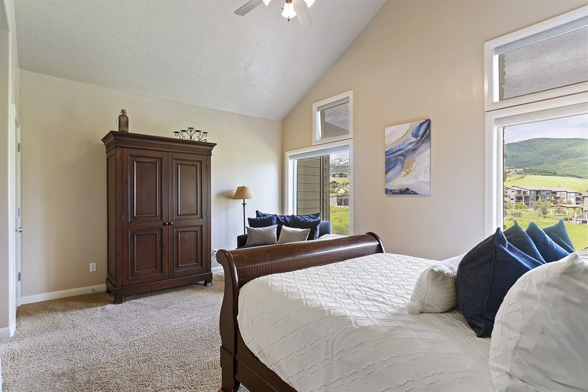 Peaceful primary suite offering comfort, space, and scenic views of the surrounding valley.