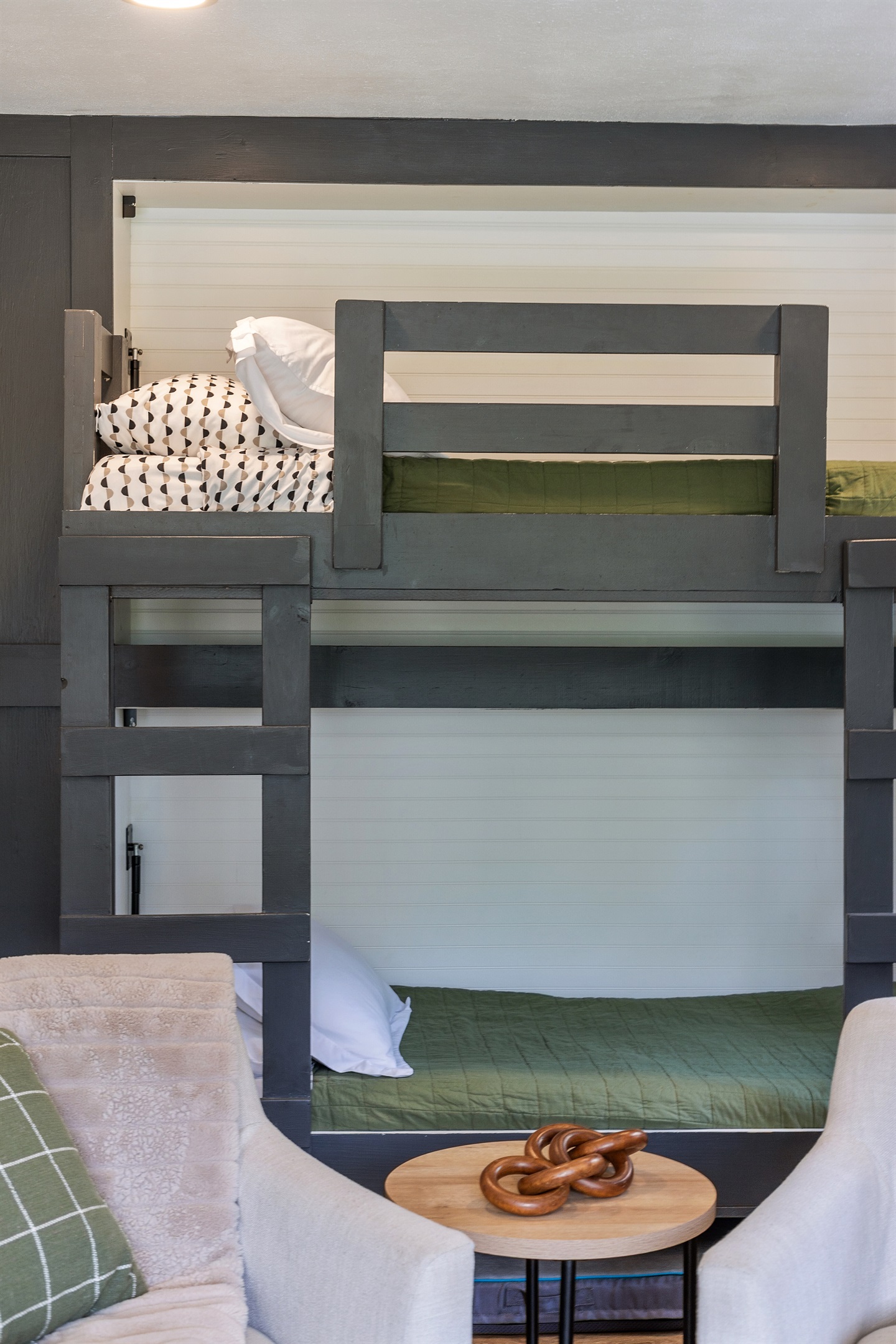 Tucked neatly away when not in use, these twin bunk beds offer the perfect blend of comfort and convenience.