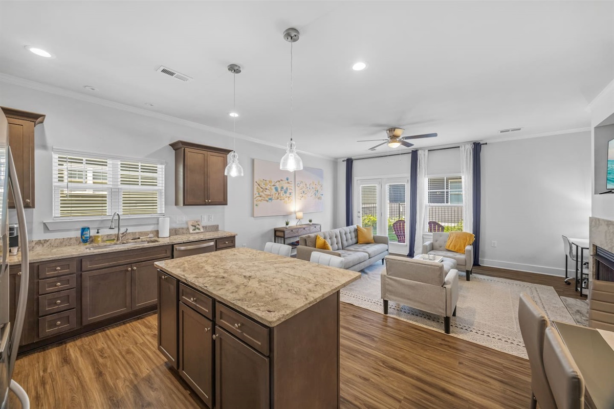 Prepare meals while staying connected with the living room and outdoor views.