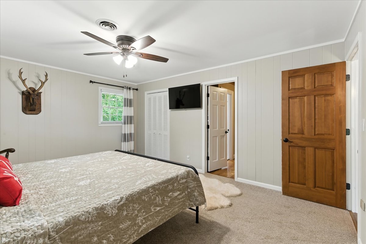 The upstairs king bedroom is spacious and charming