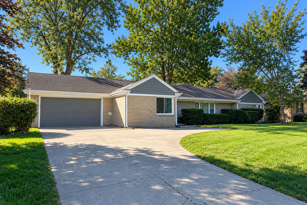 Easy parking in the attached two-car garage and spacious driveway.