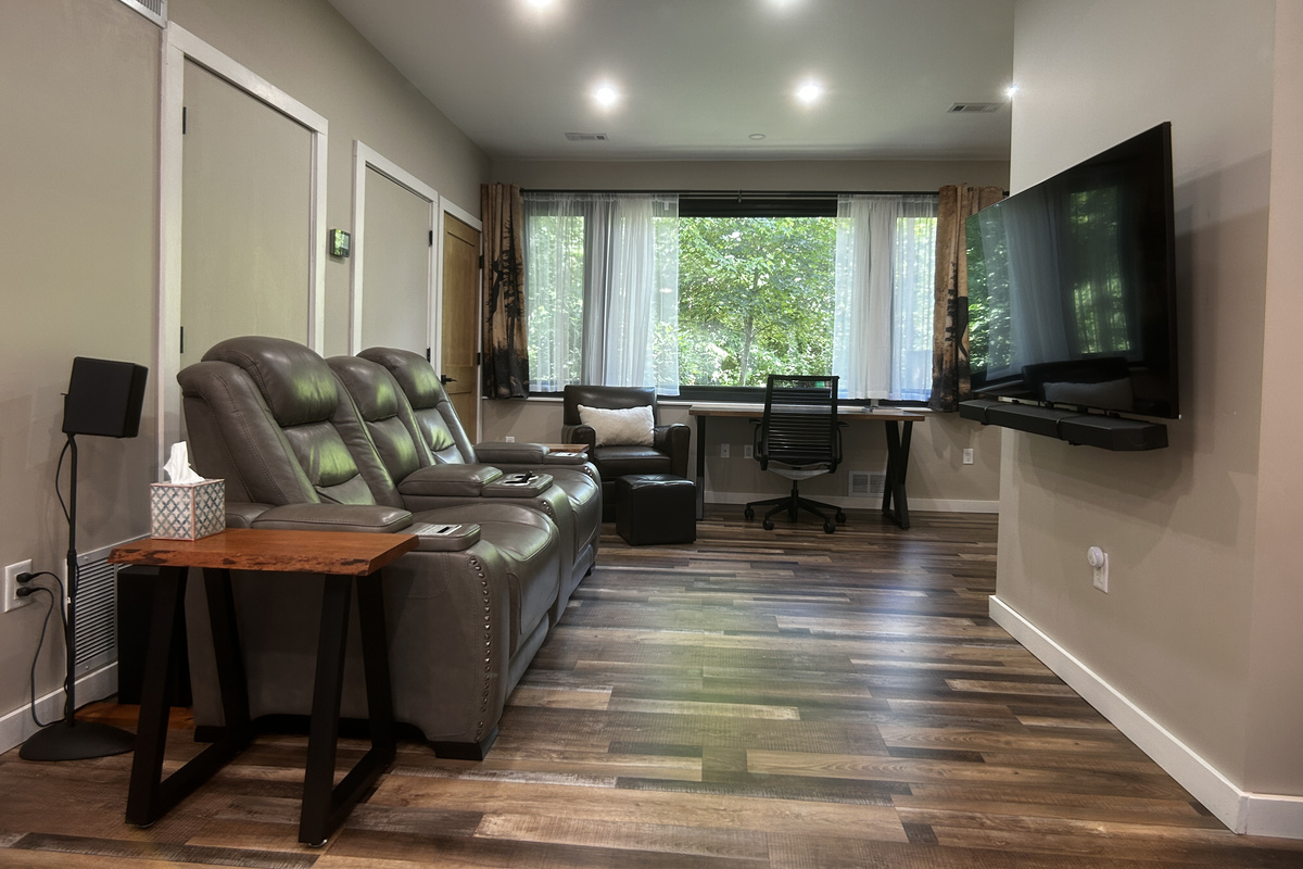 Settle down in the electric reclining love seat to watch a movie with surround sound. Roku is provided so you can log into your own streaming accounts or watch Roku TV.
