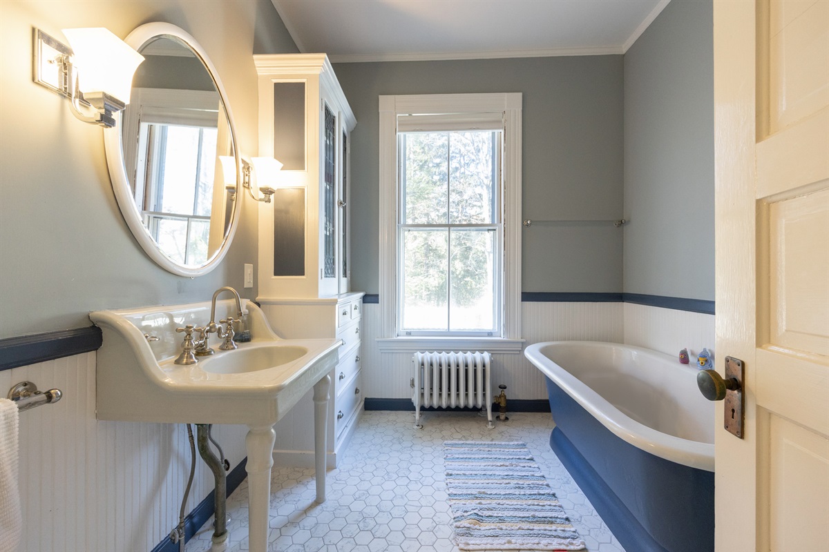 Relax in the bathtub of our second bathroom.
