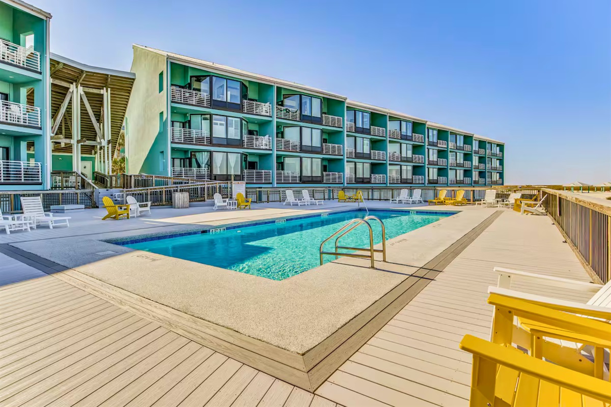 Another view of the pool area shows plenty of room to unwind and enjoy the Florida sunshine.