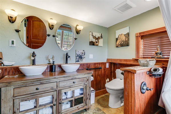 Spacious bathroom with double sinks and plenty of counter space.