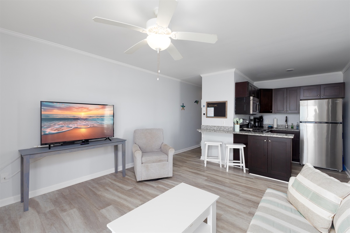 View of living room and kitchen area from the balcony