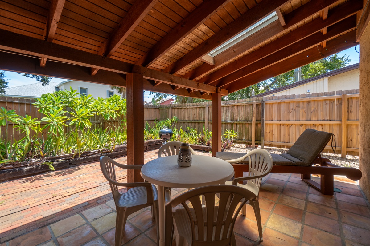 Private back patio with space to grill, dine, or just relax