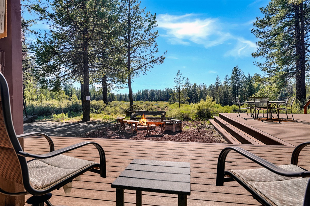 Outdoor lounge seating with panoramic riverfront surroundings