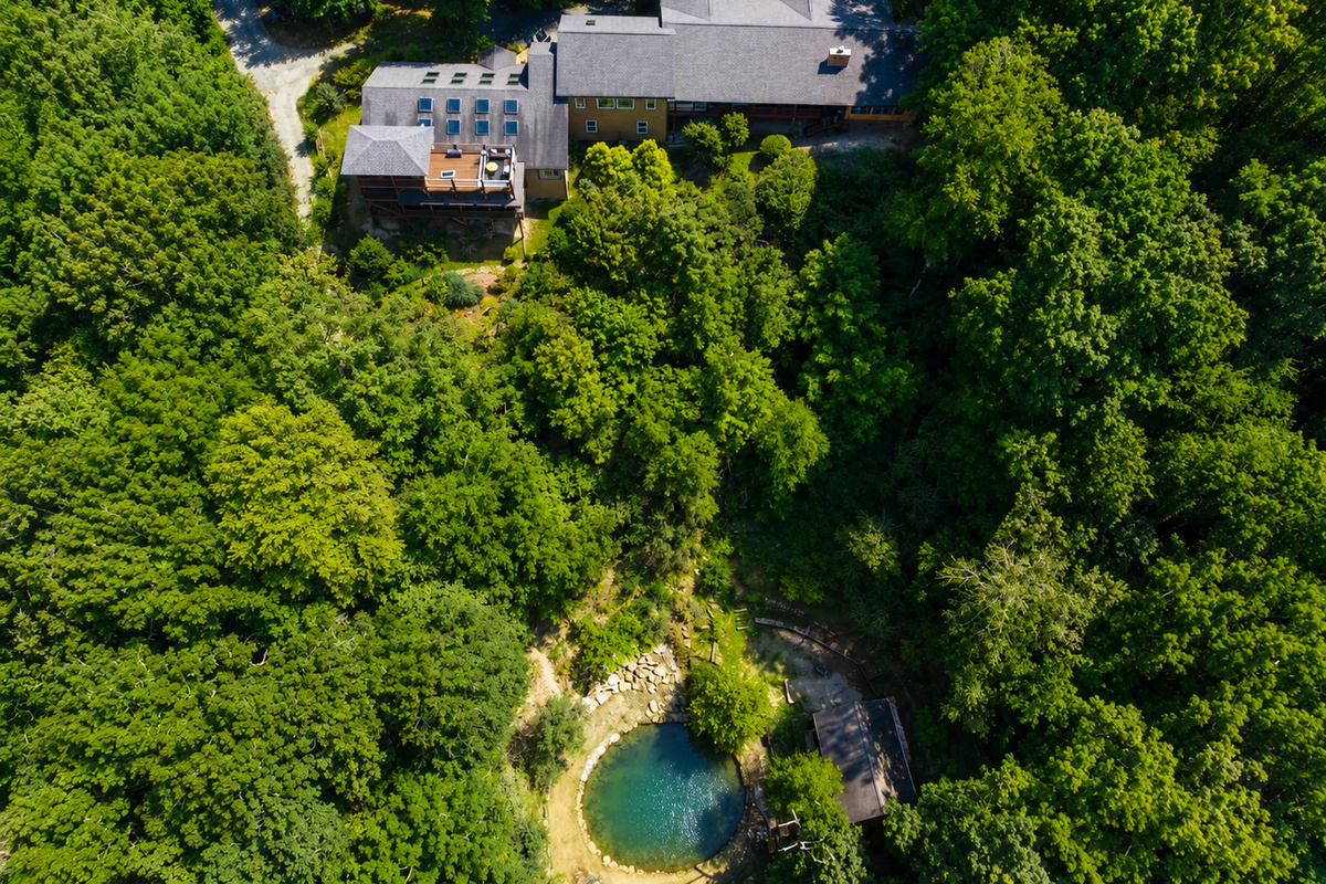 {Private Forest Resort} Tucked into the Blue Ridge Mountains with expansive decks, wooded trails, and a hidden trail to the pond and caboose.
