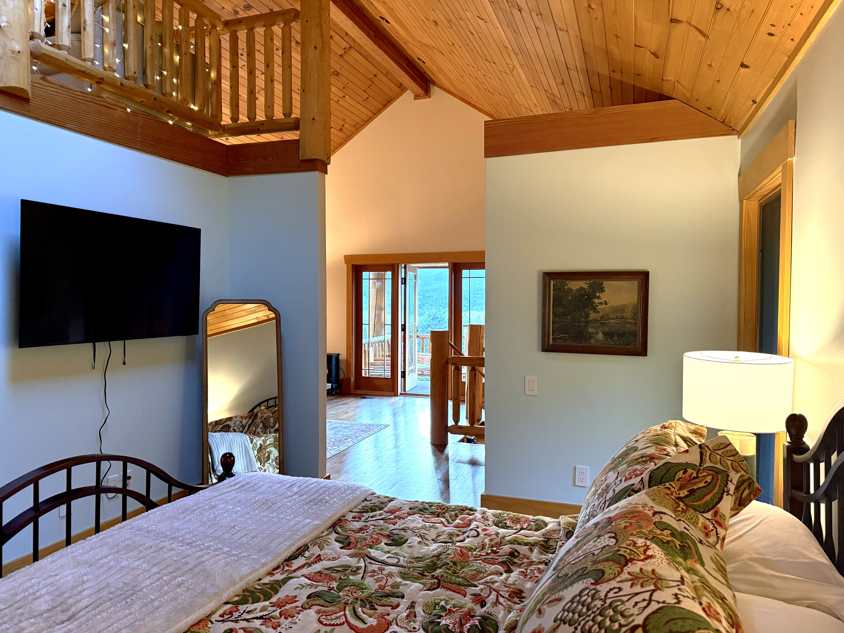 Apartment bedroom with a queen bed
