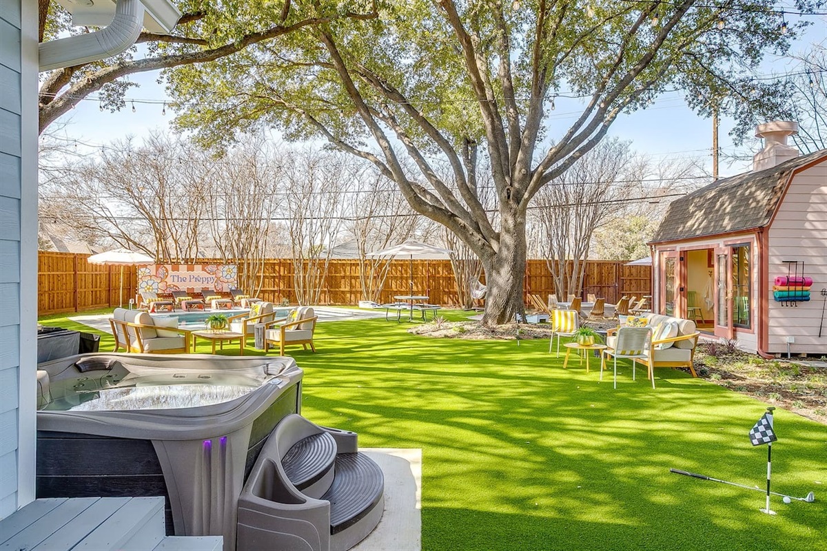 Spa retreat with putting green and mature shade trees