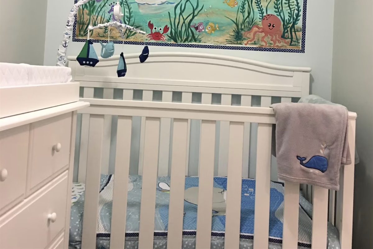 We converted one of the 2 walk-in closets in the primary bedroom into a nursery in case you've got a little one tagging along.