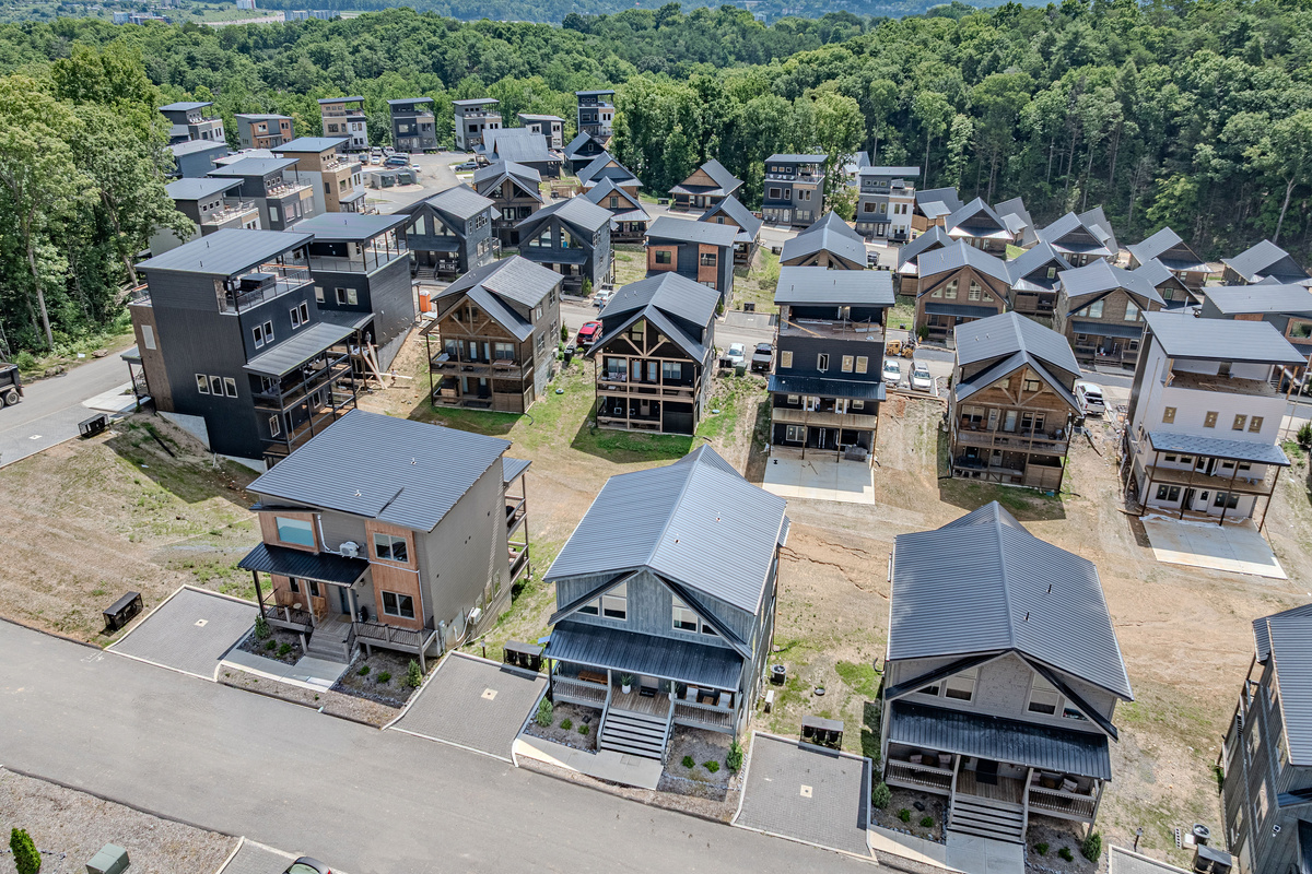 Aerial overview of the neighborhood layout and nearby cabins.