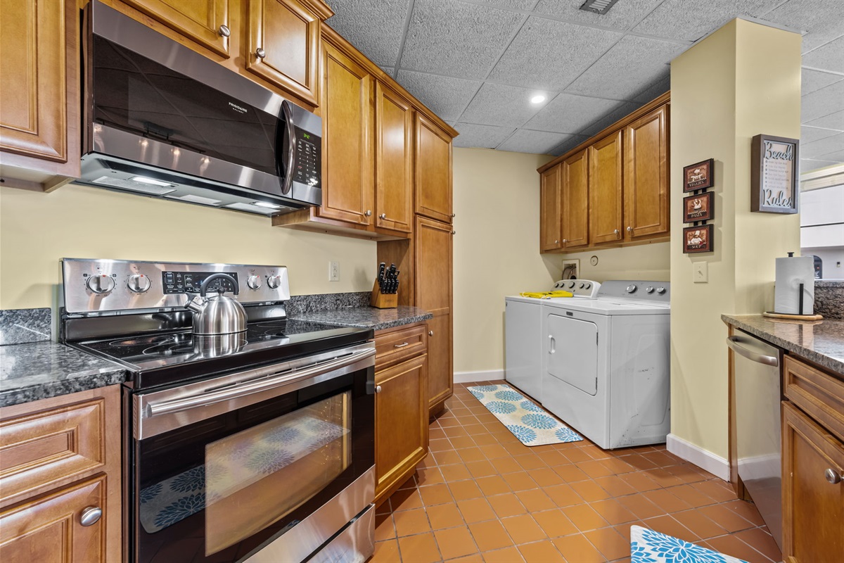 Spacious, step-free kitchen with full-size appliances and in-unit washer/dryer&mdash;designed for easy movement and everyday convenience