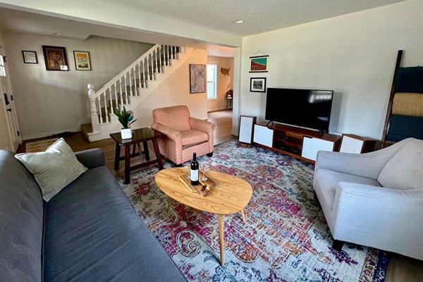 Imagine curling up in this cozy living room for a movie night or perhaps a family game night. We offer board games for our guests to enjoy during their stay with us! 